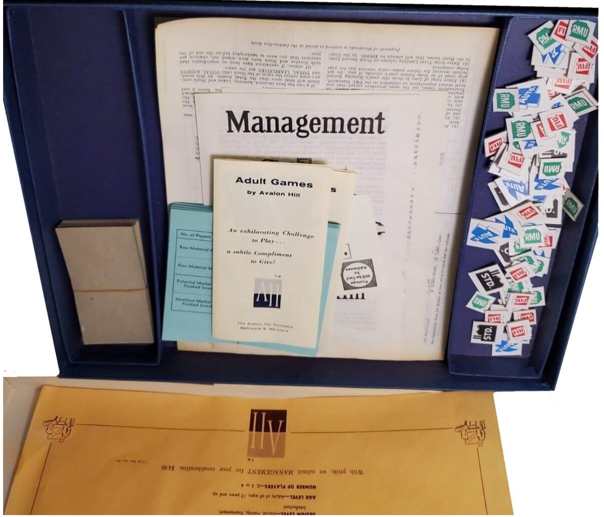 The open box of a vintage board game with rules booklets and loose cardboard chits heaped in one corner